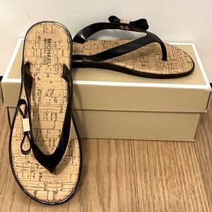 Michael Kors Cheyenne black patent flip flops